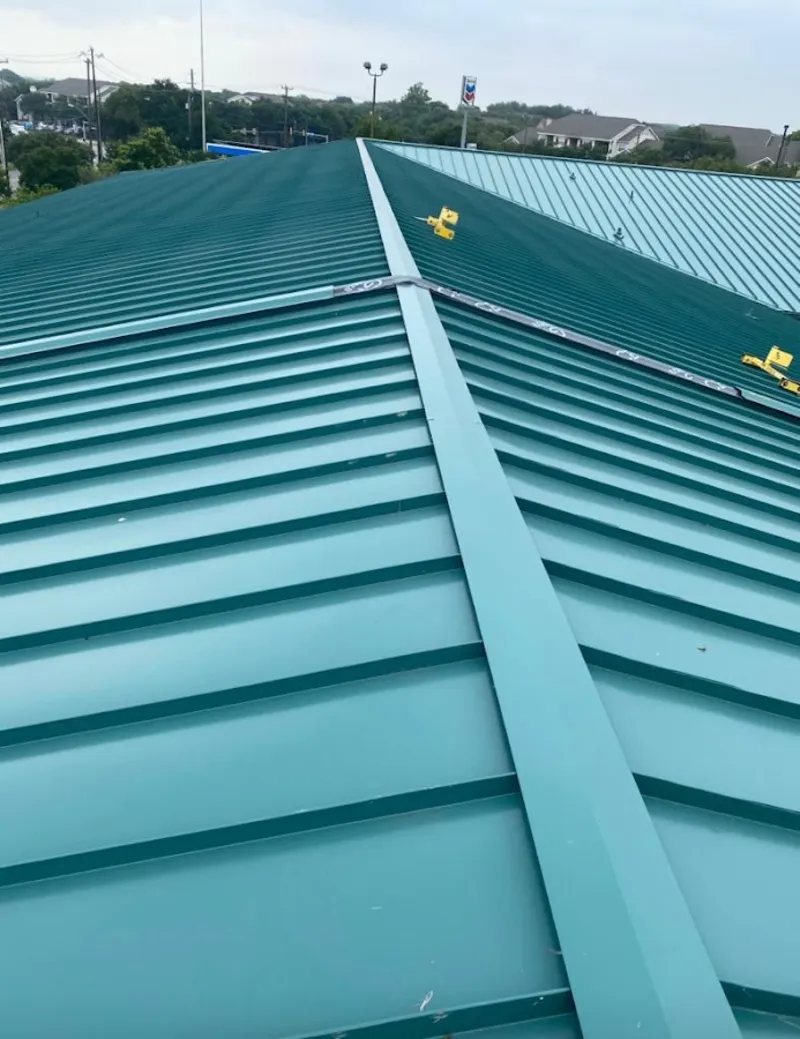 Green commercial metal roof ridge and valley for Metal Roof Repair in Vandenberg Village